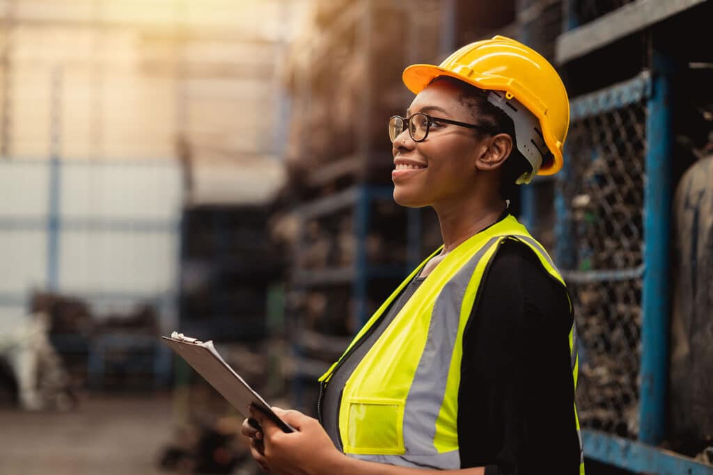 Women engineer working in factory industry.